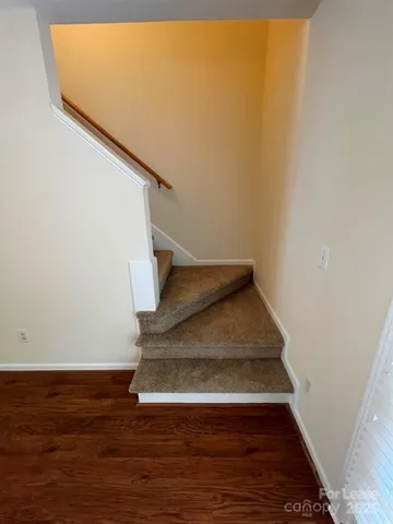 a view of entryway with wooden floor