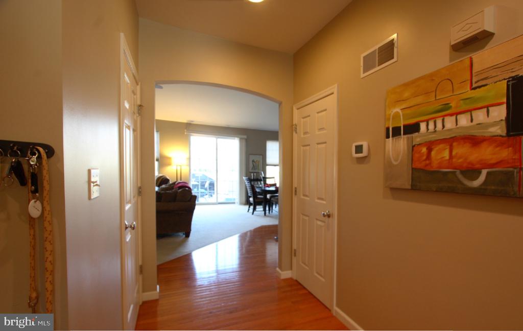 1013 Sloan Street Lititz, PA 17543 - Photo 15 of 22 a view of a hallway with wooden floor windows and livingroom