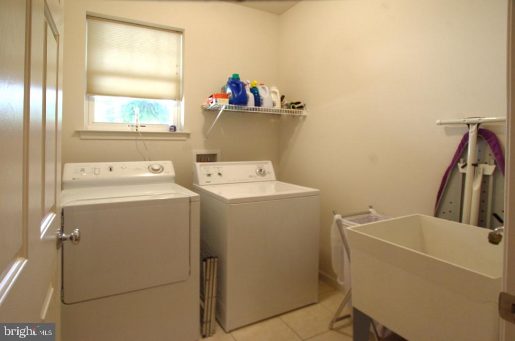 1013 Sloan Street Lititz, PA 17543 - Photo 16 of 22 a utility room with dryer and washer