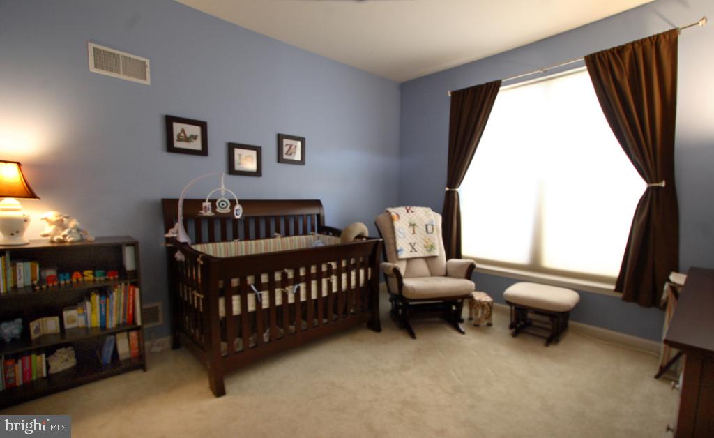 1013 Sloan Street Lititz, PA 17543 - Photo 19 of 22 a bedroom with furniture and a bed