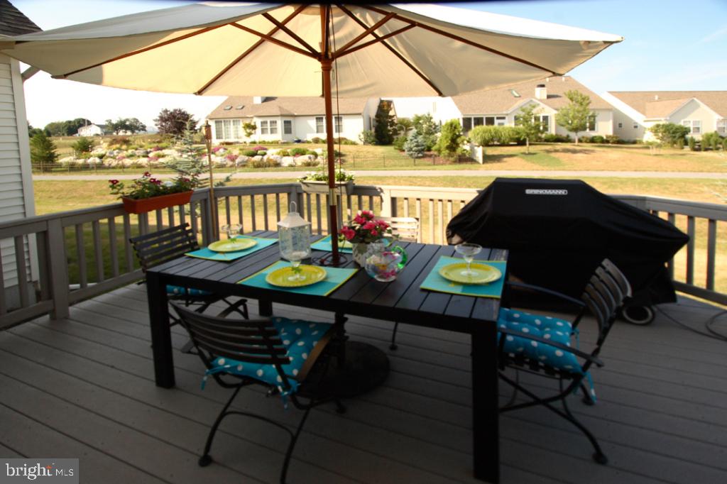 1013 Sloan Street Lititz, PA 17543 - Photo 4 of 22 a view of a balcony with chair and wooden floor