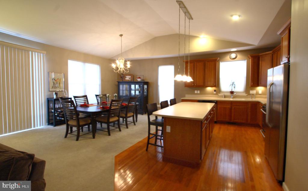 1013 Sloan Street Lititz, PA 17543 - Photo 9 of 22 a large kitchen with a table and chairs
