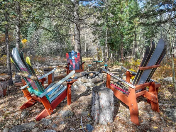 a view of a chairs and table in the outdoor