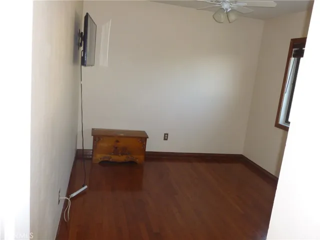 an empty room with a bench