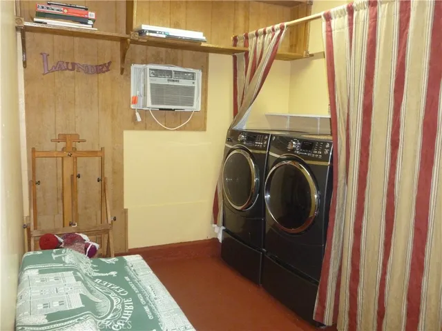 swimming pool view with a seating space