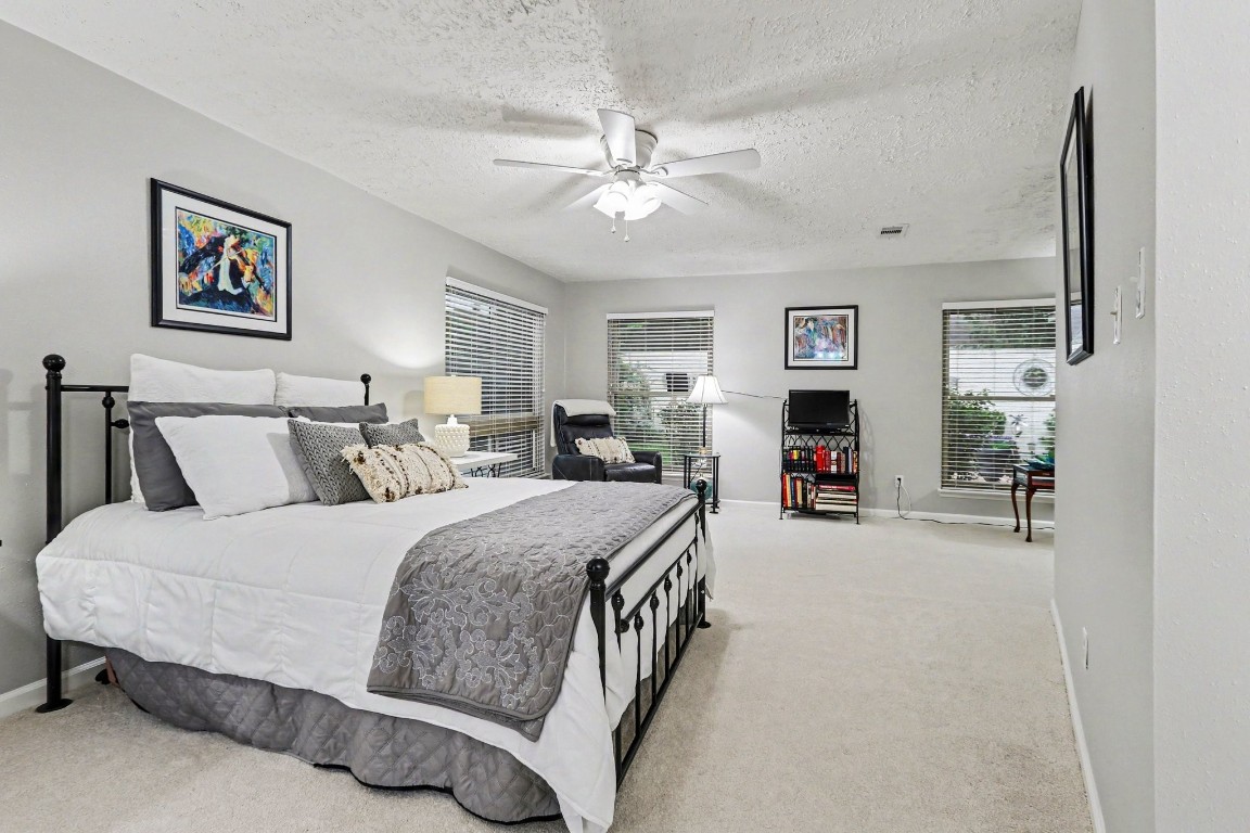 8327 Spring Wind Drive Houston, TX 77040 - Photo 14 of 30 The room is spacious enough to accommodate large furniture along with a comfortable seating area