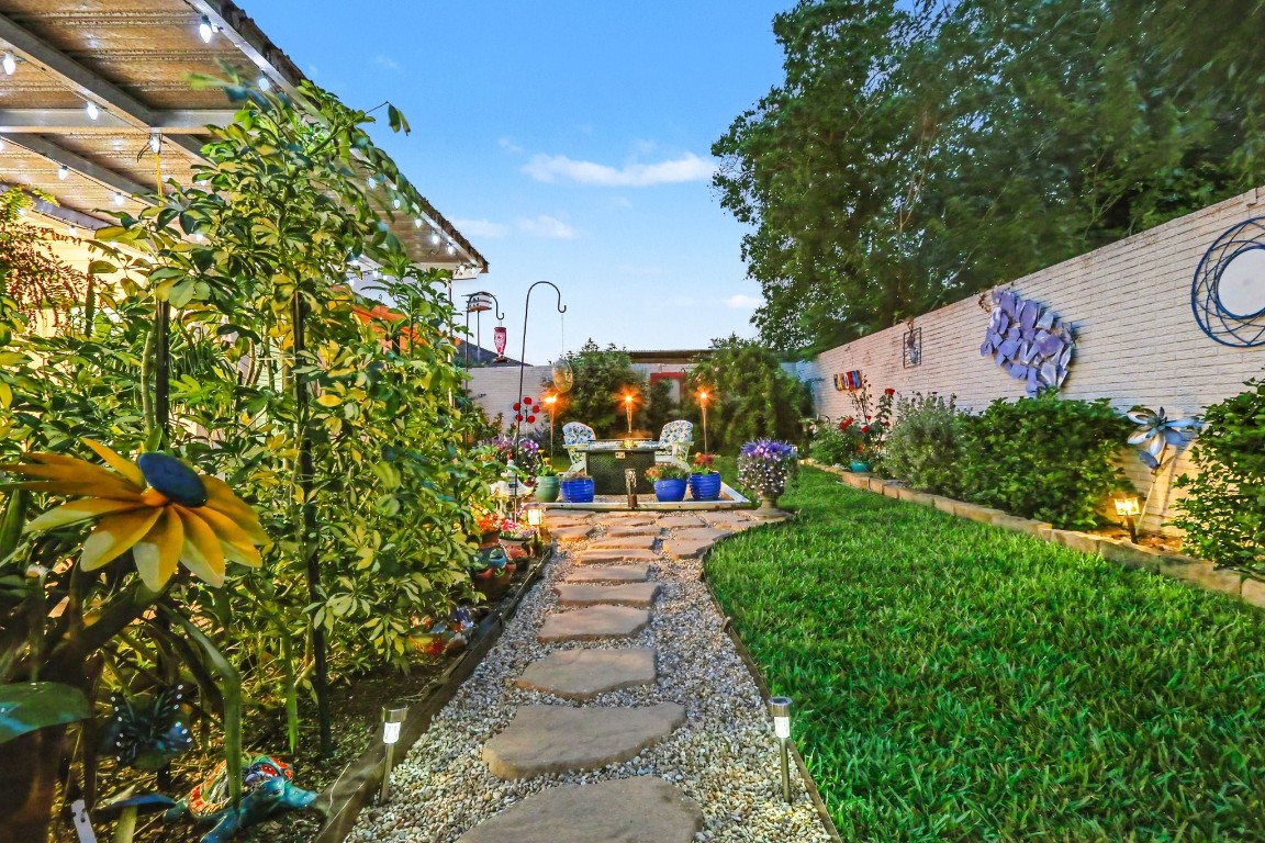 8327 Spring Wind Drive Houston, TX 77040 - Photo 21 of 30 The yard space is lush and beautifully landscaped