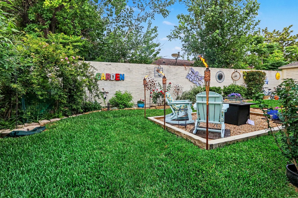 8327 Spring Wind Drive Houston, TX 77040 - Photo 24 of 30 Abundant greenery enhances the space