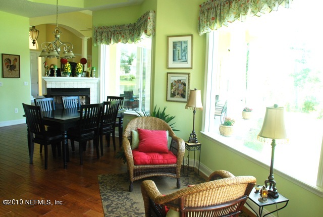 2571 Woodgrove Road Fleming Island, FL 32003 - Photo 12 of 36 Sitting area overlooking the lake