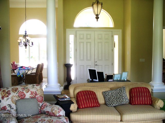 2571 Woodgrove Road Fleming Island, FL 32003 - Photo 14 of 36 Formal Living overlooking Dining & Foyer