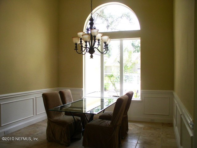 2571 Woodgrove Road Fleming Island, FL 32003 - Photo 16 of 36 Stone Large Formal Dining w/Wainscot