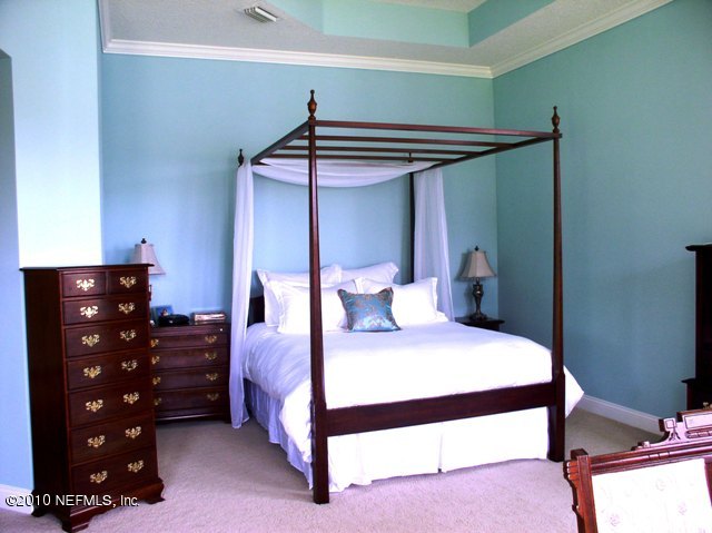 2571 Woodgrove Road Fleming Island, FL 32003 - Photo 17 of 36 Master Bed with sitting area on Pond