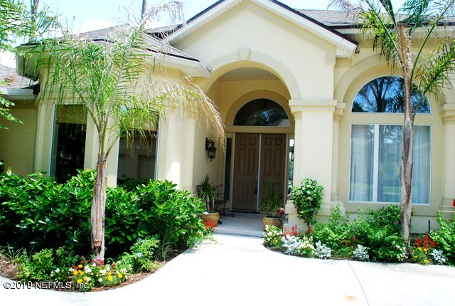 2571 Woodgrove Road Fleming Island, FL 32003 - Photo 21 of 36 Lovely Landscaping and Flowers