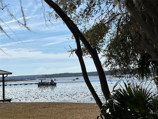 a view of a backyard of a house