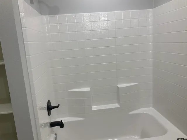 a close up of a bathtub