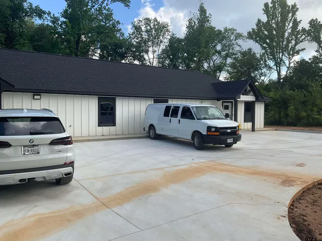 a car parked in front of a house