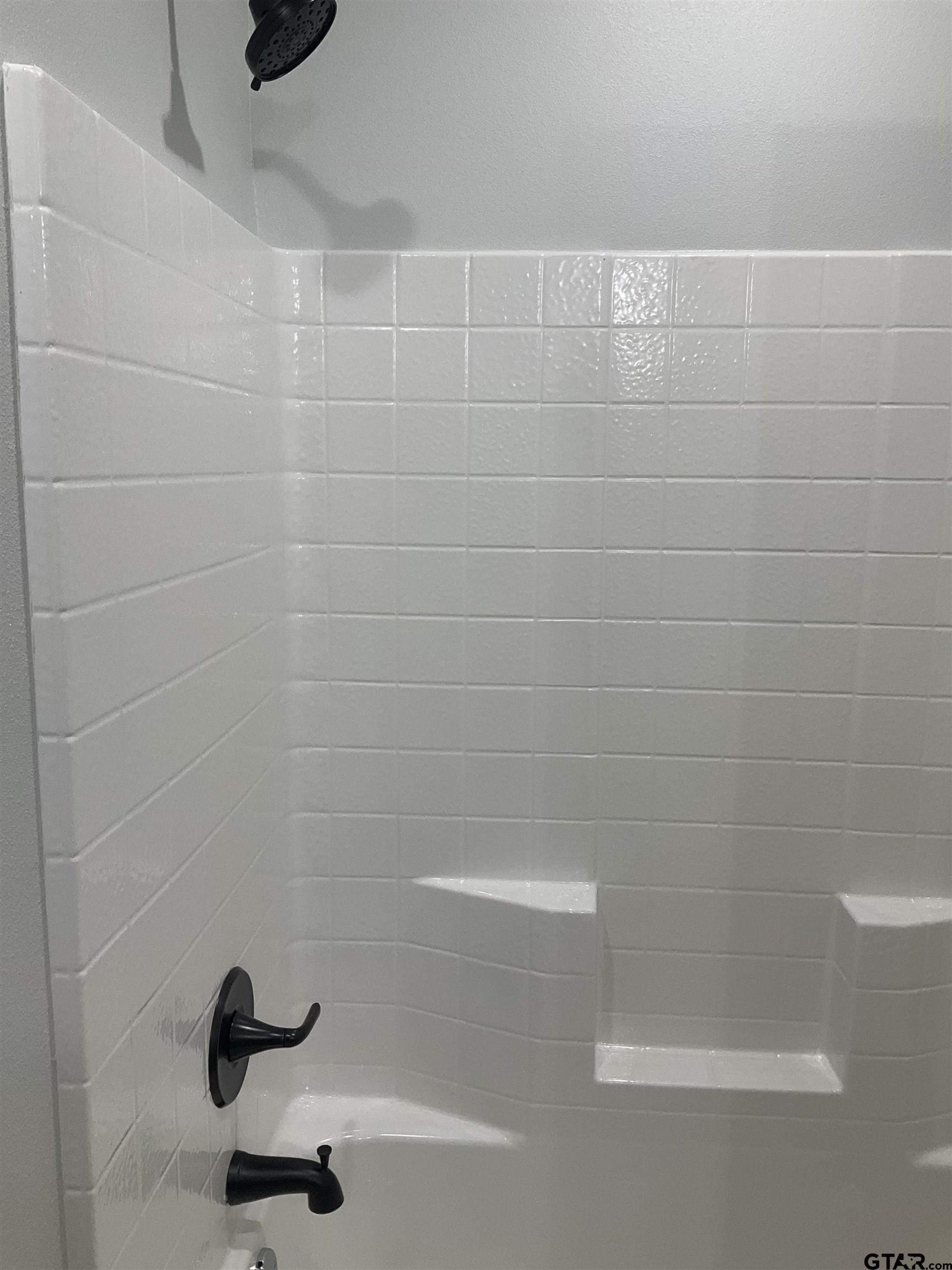 13220 Teton Road Tyler, TX 75709 - Photo 32 of 35 a bathroom with a shower