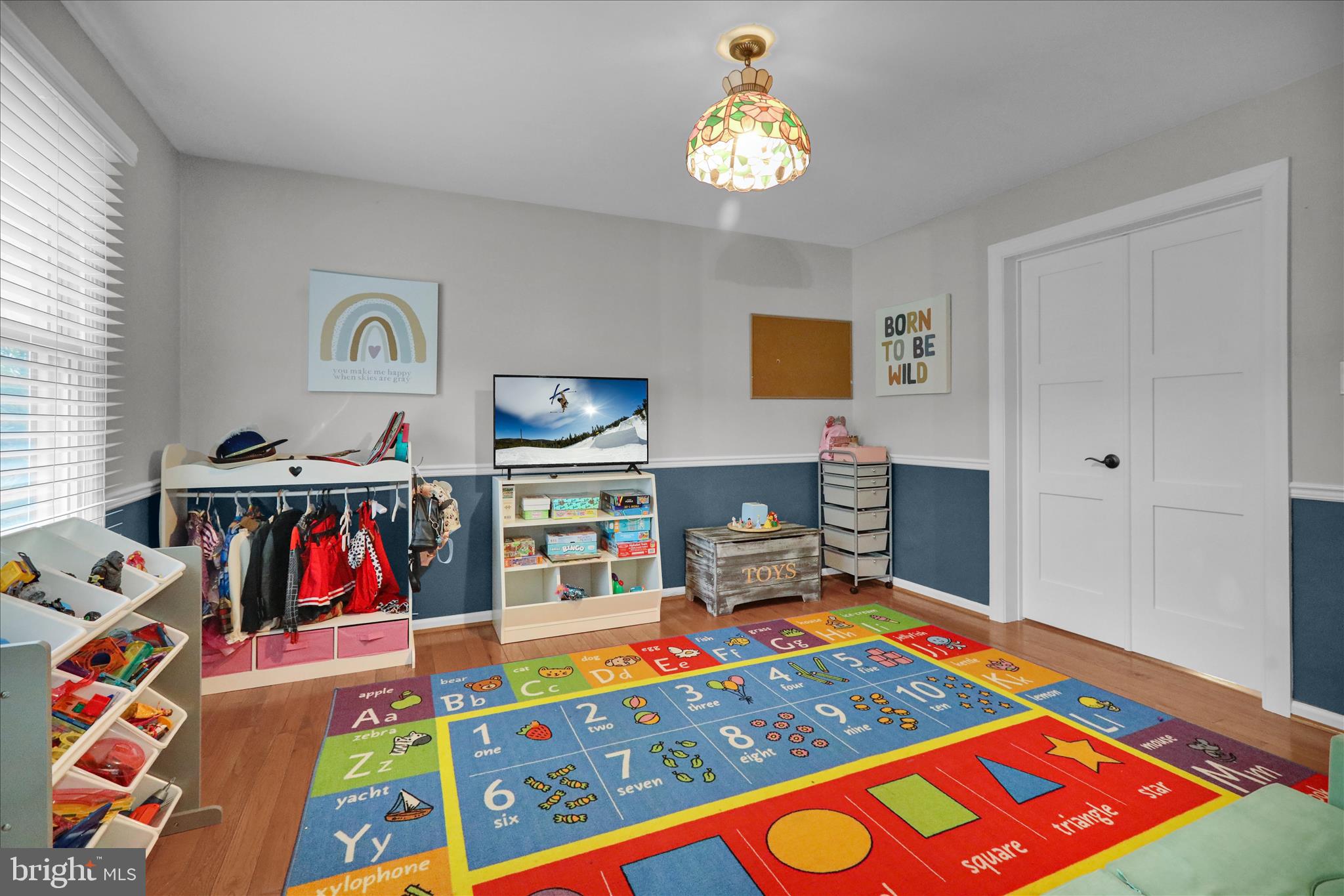 2930 Reedy Road Sinking Spring, PA 19608 - Photo 16 of 45 a living room with furniture and a baby crib
