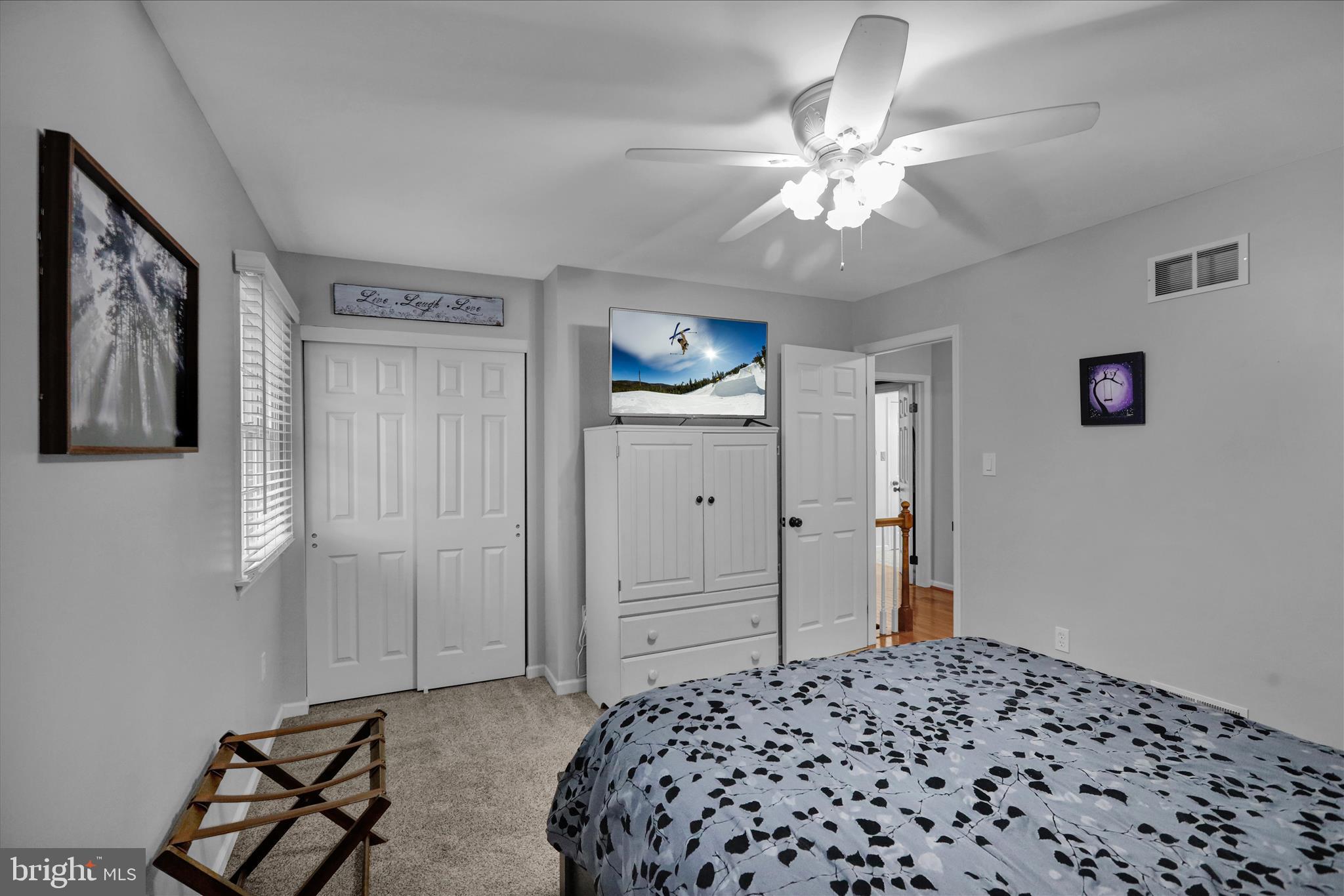 2930 Reedy Road Sinking Spring, PA 19608 - Photo 23 of 45 a bedroom with a bed and a chandelier