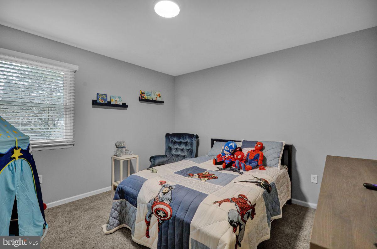 2930 Reedy Road Sinking Spring, PA 19608 - Photo 30 of 45 a bedroom with a bed and a window