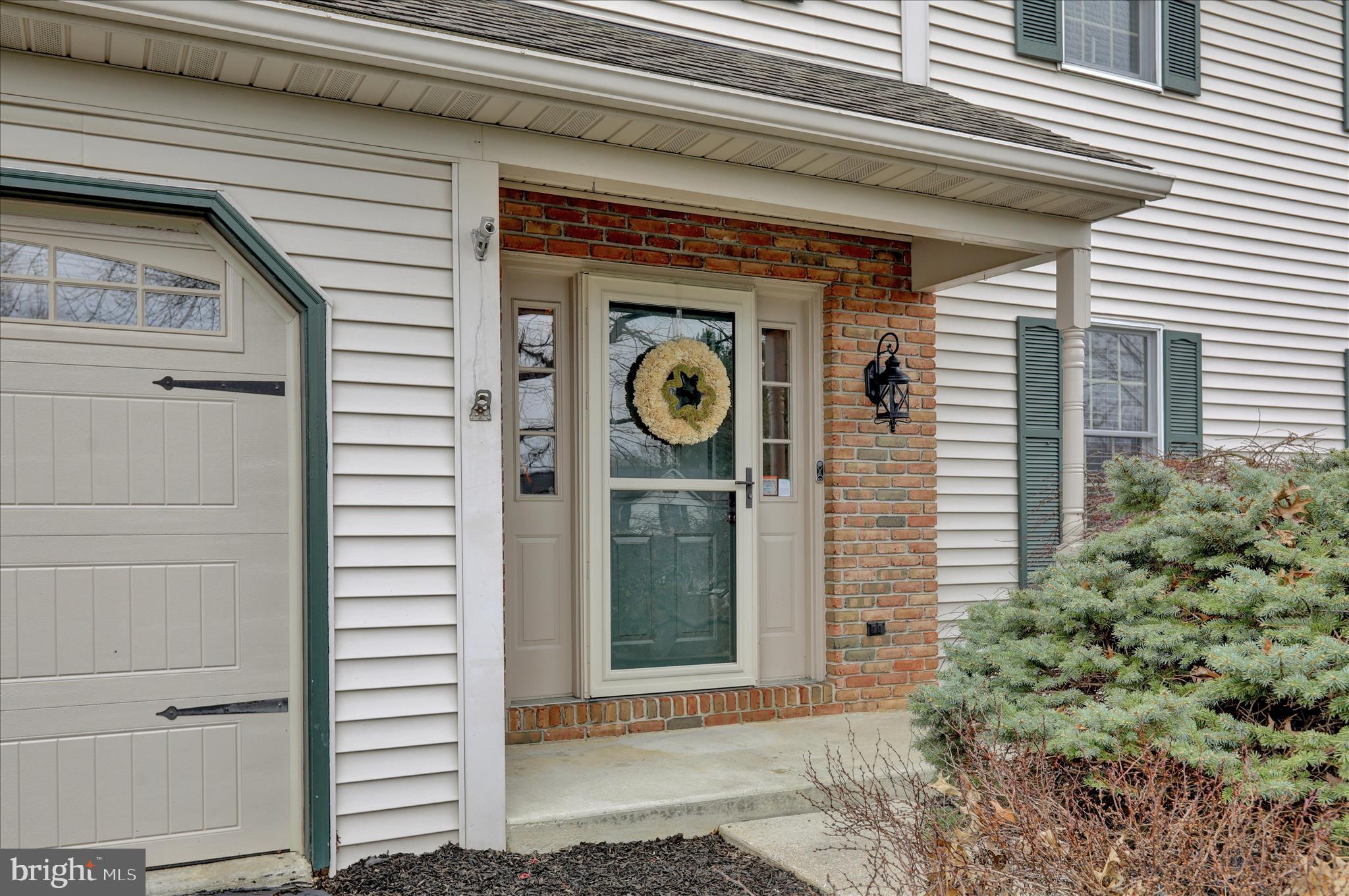 2930 Reedy Road Sinking Spring, PA 19608 - Photo 3 of 45 a front view of a house with garden