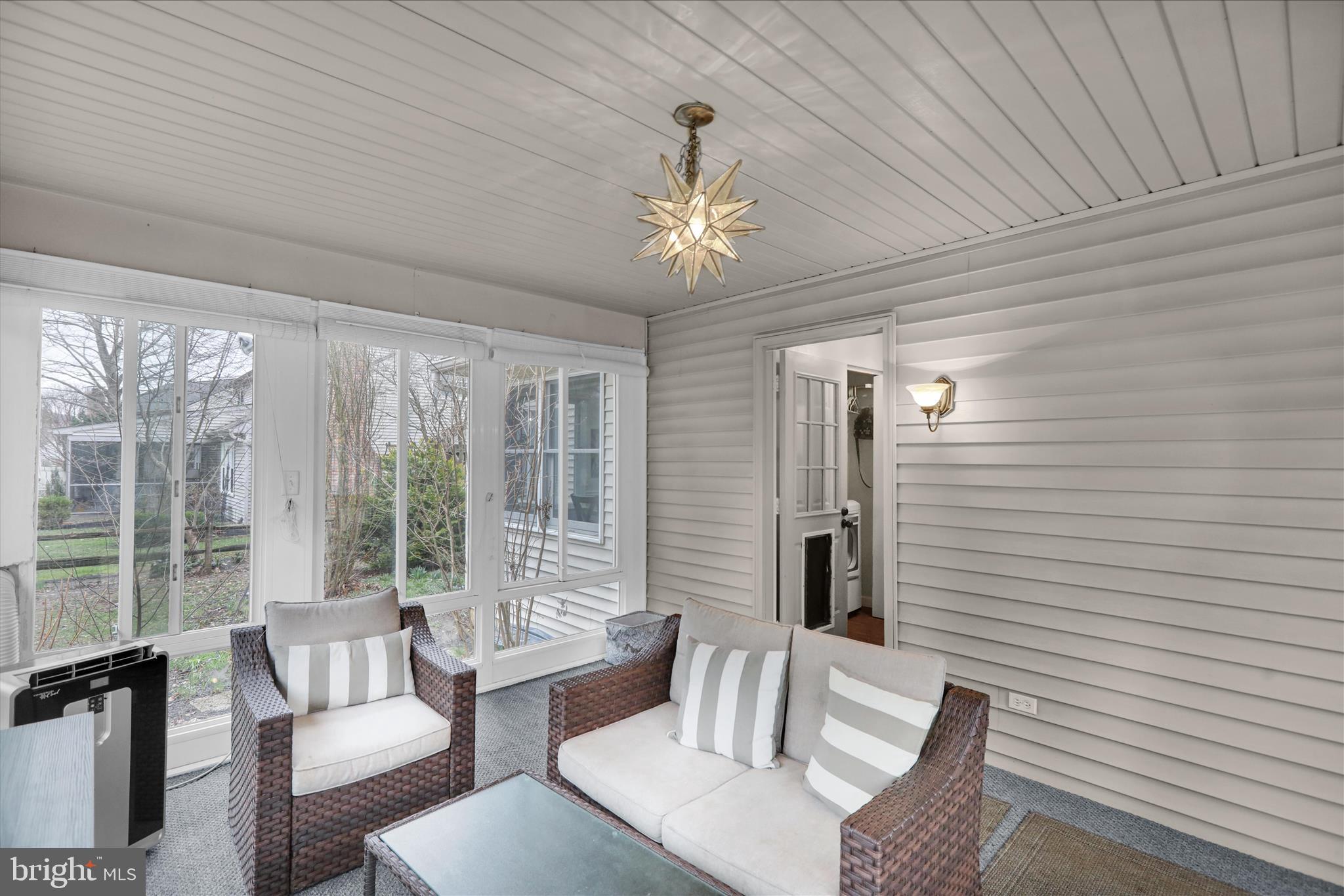 2930 Reedy Road Sinking Spring, PA 19608 - Photo 33 of 45 a living room with furniture and a chandelier