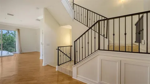 a bathroom with a granite countertop sink a large mirror and shower