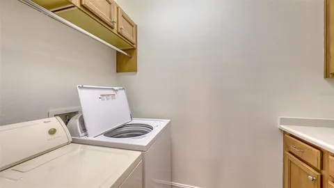 a balcony with trees in front of it