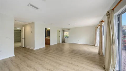 a swimming pool with outdoor seating and yard