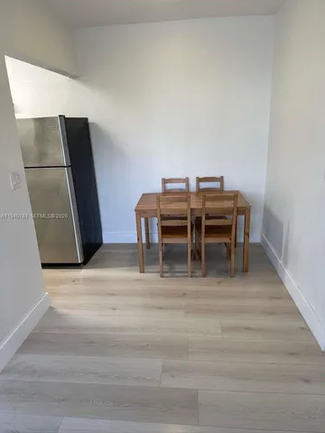 a view of a livingroom with furniture