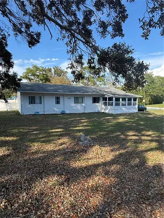 a view of a house with a ocean view
