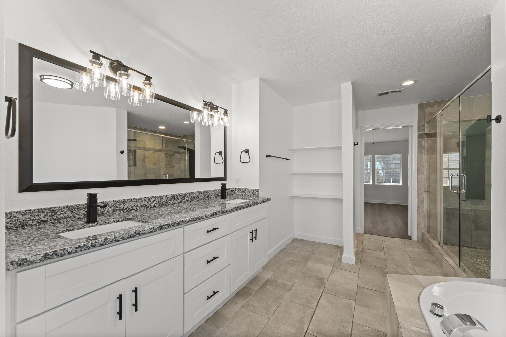 1678 Beaconshire Houston, TX 77077 - Photo 13 of 30 a bathroom with a granite countertop sink mirror and double