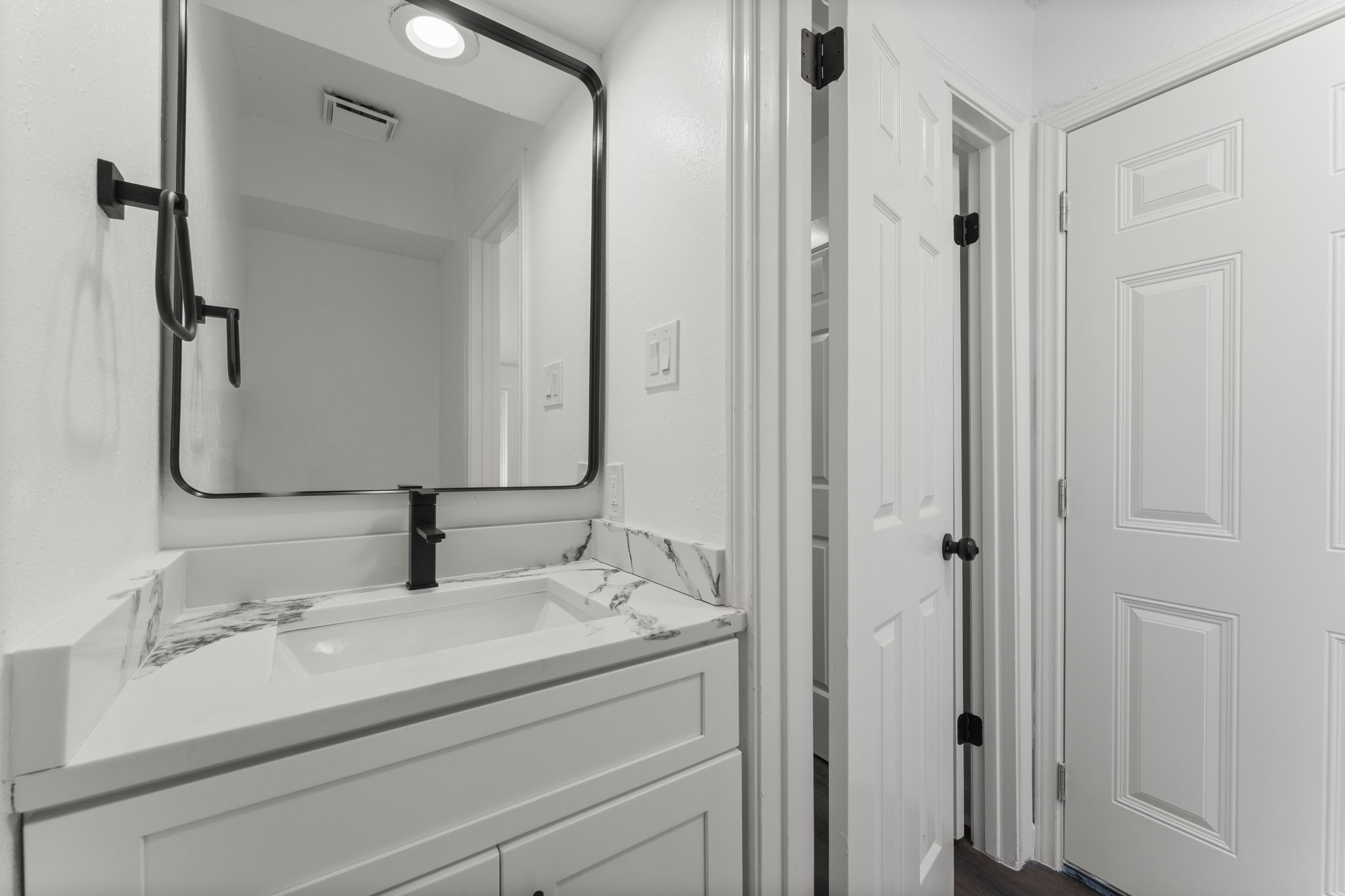 1678 Beaconshire Houston, TX 77077 - Photo 16 of 30 a bathroom with a sink and a mirror