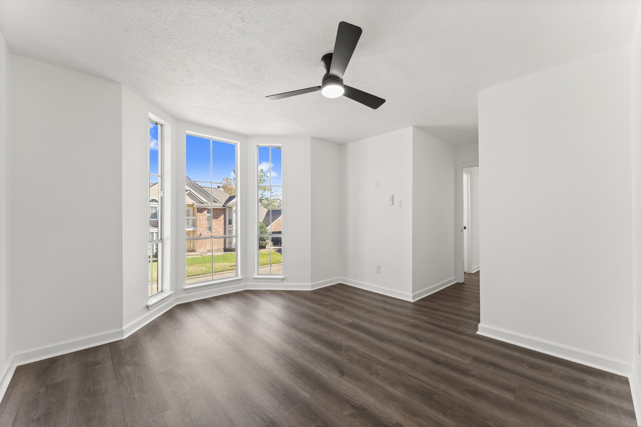 1678 Beaconshire Houston, TX 77077 - Photo 24 of 30 wooden floor in an empty room with a window