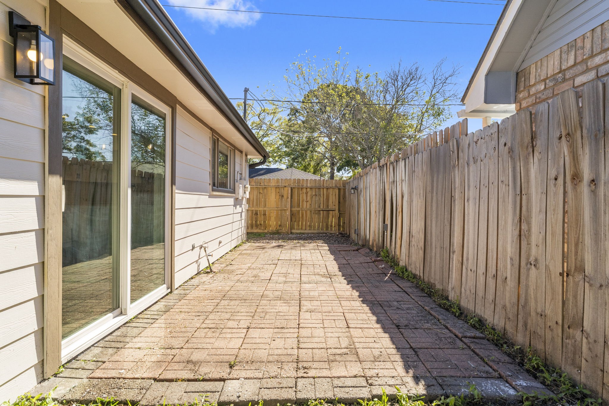 1678 Beaconshire Houston, TX 77077 - Photo 28 of 30 a view of a backyard with pathway