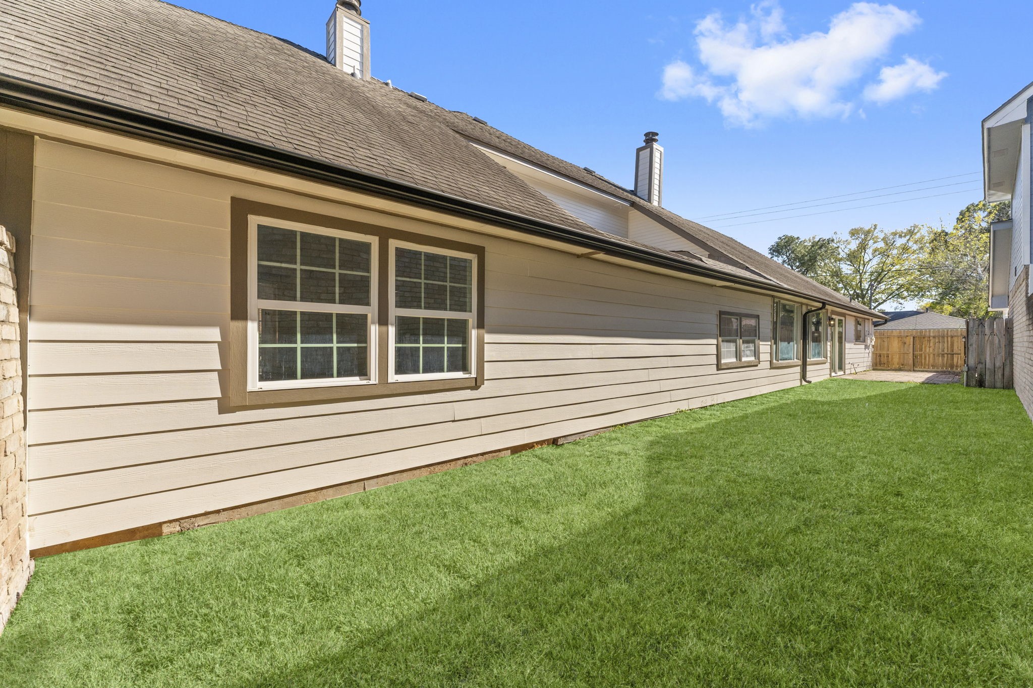 1678 Beaconshire Houston, TX 77077 - Photo 29 of 30 a front view of a house with a garden