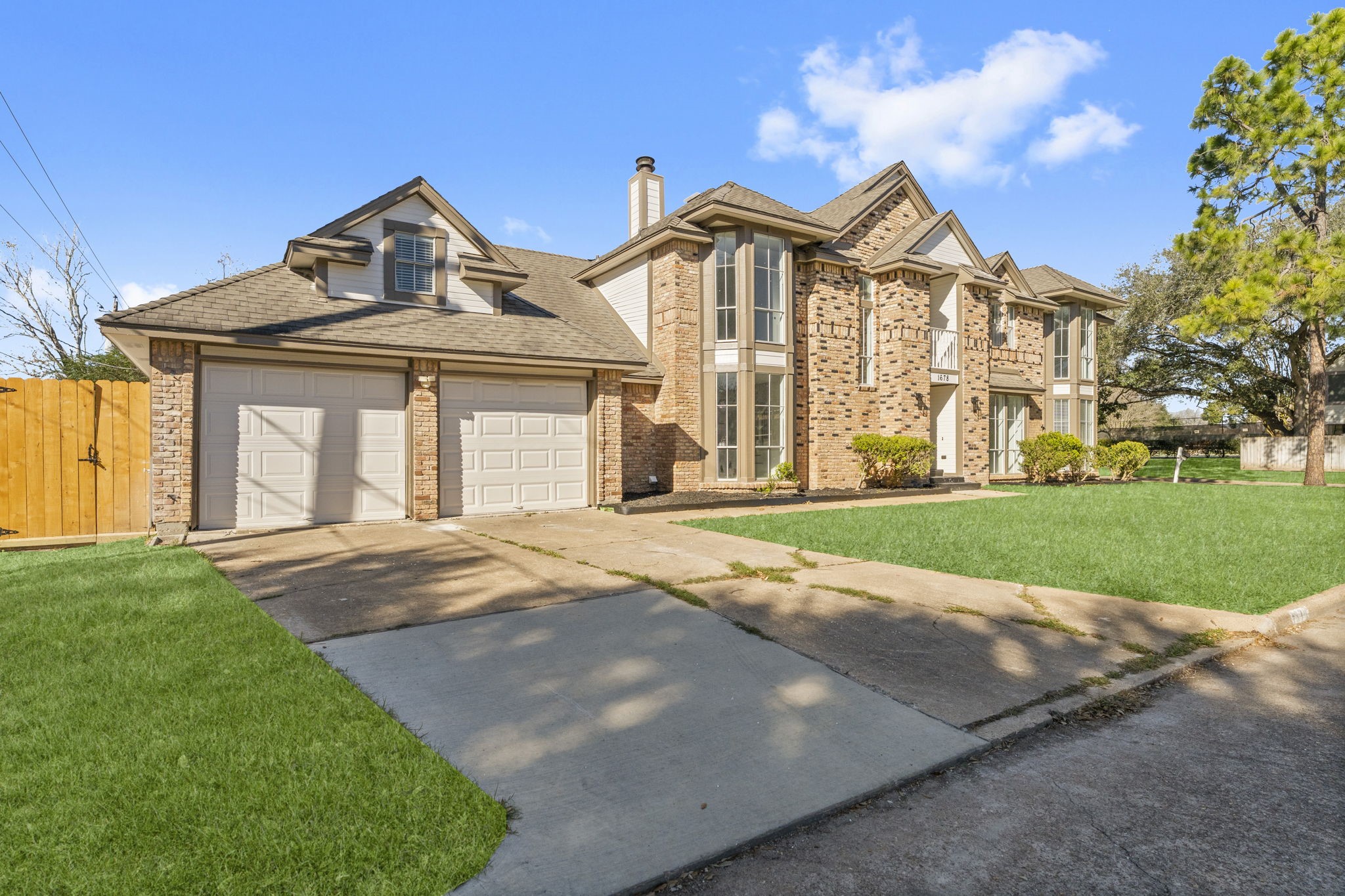 1678 Beaconshire Houston, TX 77077 - Photo 30 of 30 a front view of a house with a yard