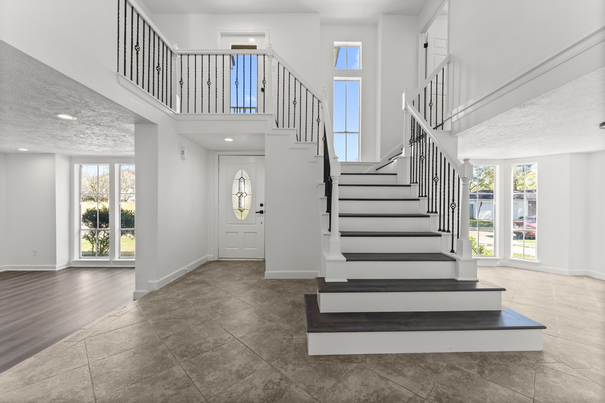 1678 Beaconshire Houston, TX 77077 - Photo 3 of 30 a view of entryway and hall with wooden floor