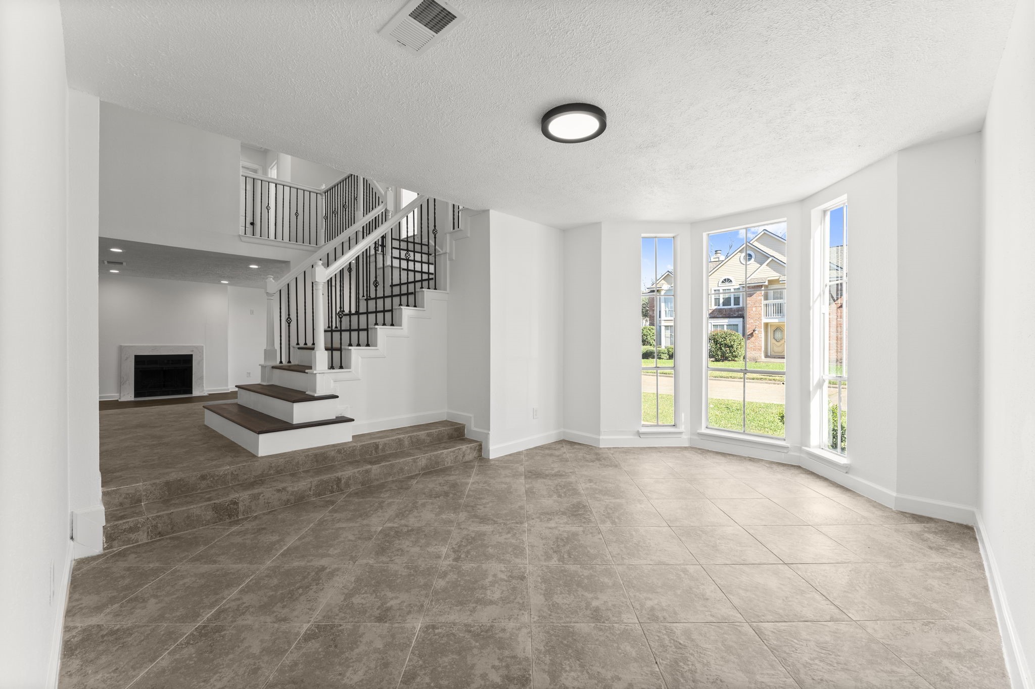 1678 Beaconshire Houston, TX 77077 - Photo 4 of 30 a view of an empty room with a window