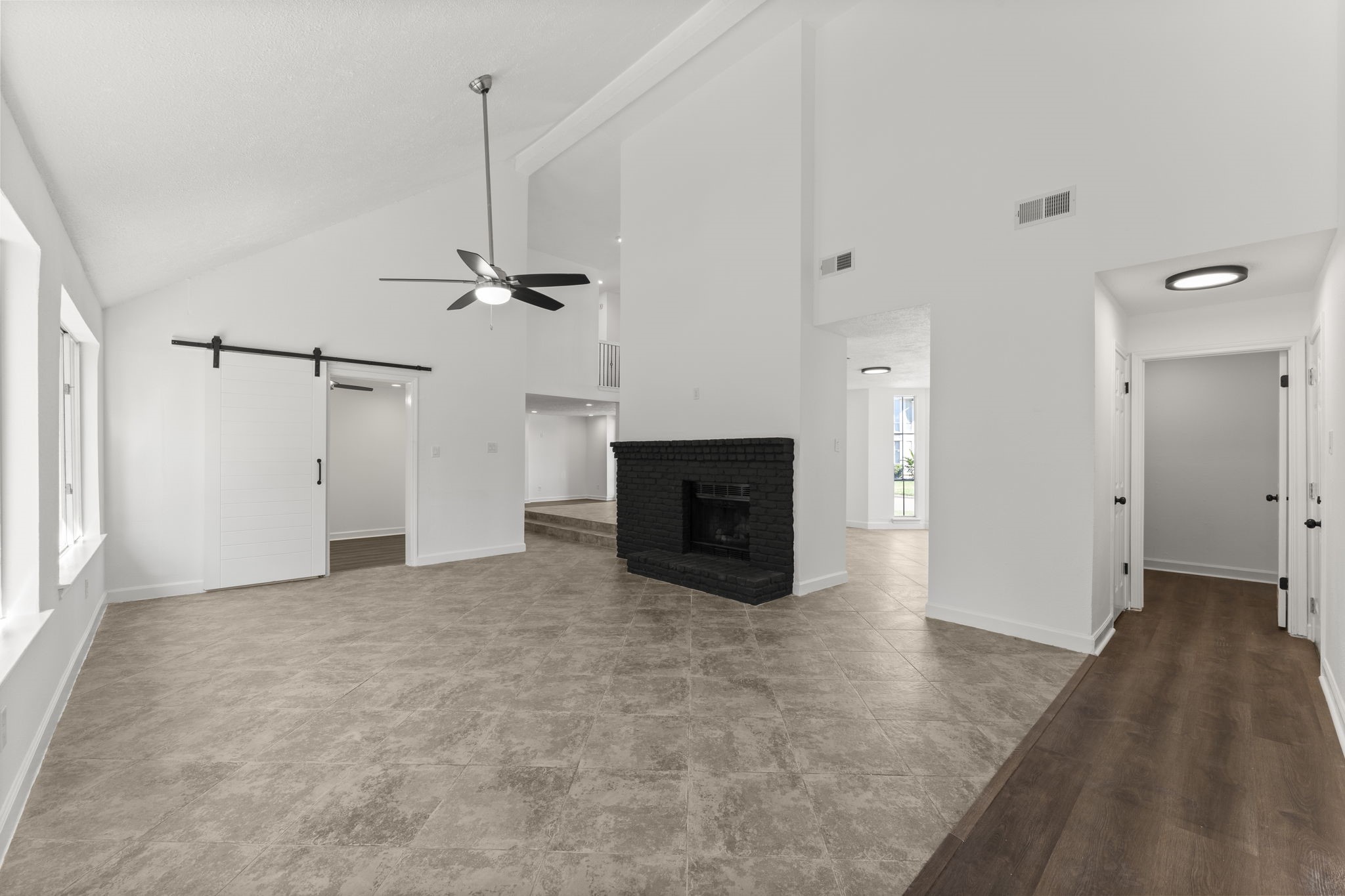 1678 Beaconshire Houston, TX 77077 - Photo 6 of 30 a view of a livingroom with wooden floor