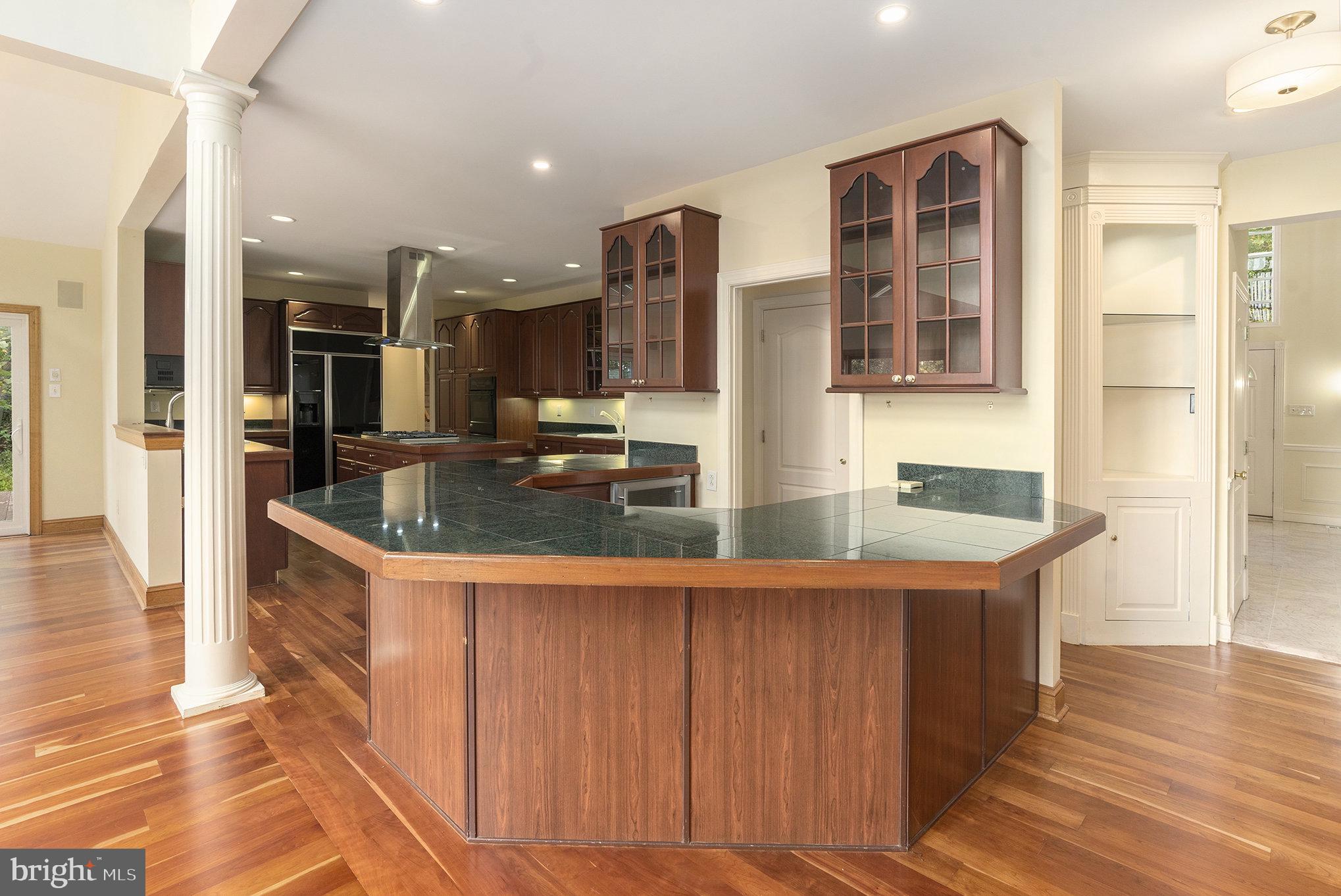 0 Tower Road Sellersville, PA 18960 - Photo 12 of 70 a kitchen with stainless steel appliances granite countertop a sink a stove and a wooden floors