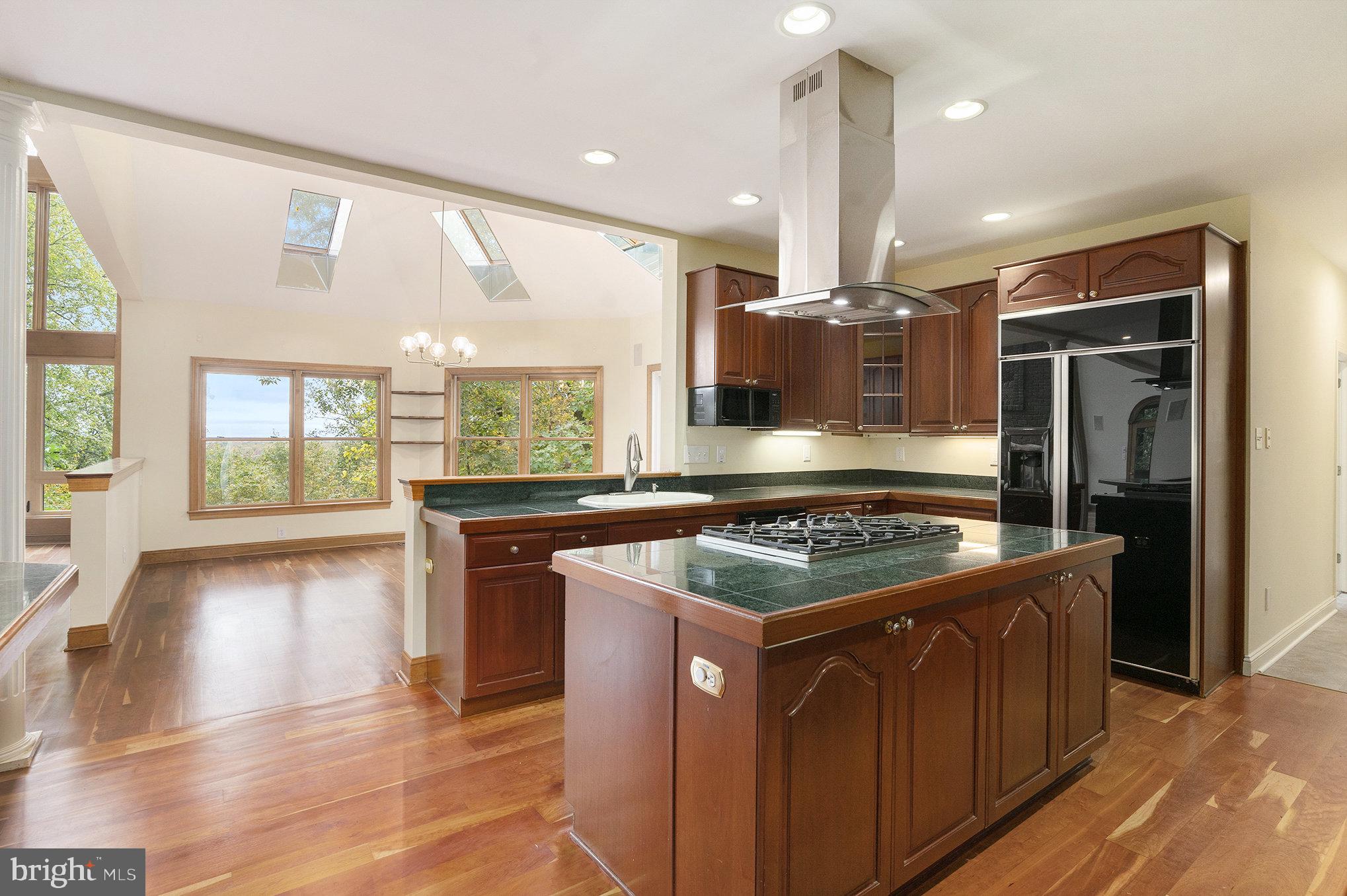 0 Tower Road Sellersville, PA 18960 - Photo 17 of 70 a kitchen with stainless steel appliances granite countertop a stove a refrigerator and a sink
