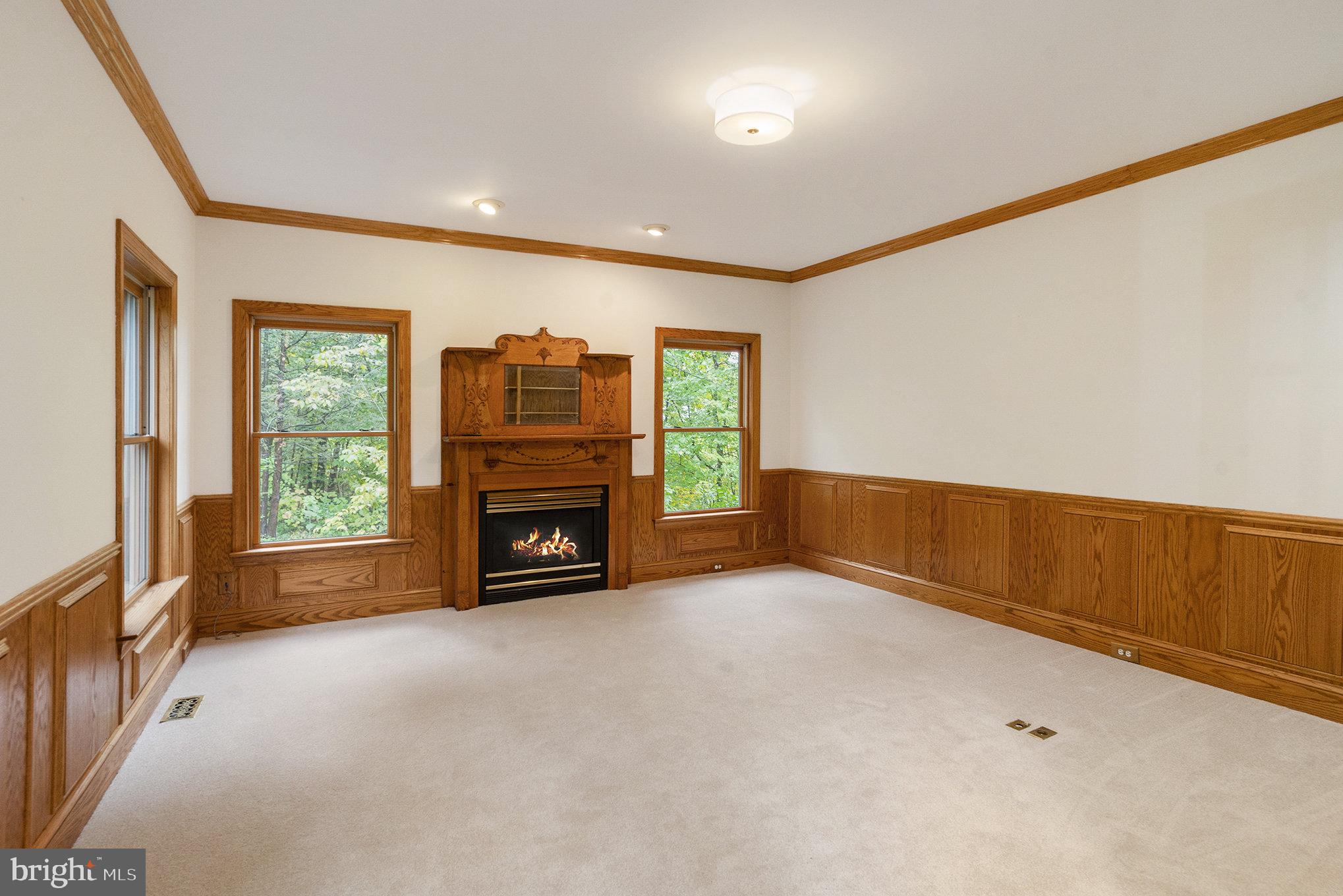 0 Tower Road Sellersville, PA 18960 - Photo 21 of 70 a view of an empty room with a fireplace and a large window