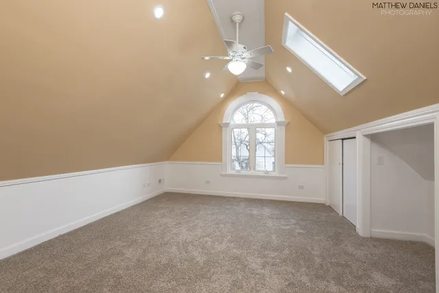 an empty room with a empty space and windows