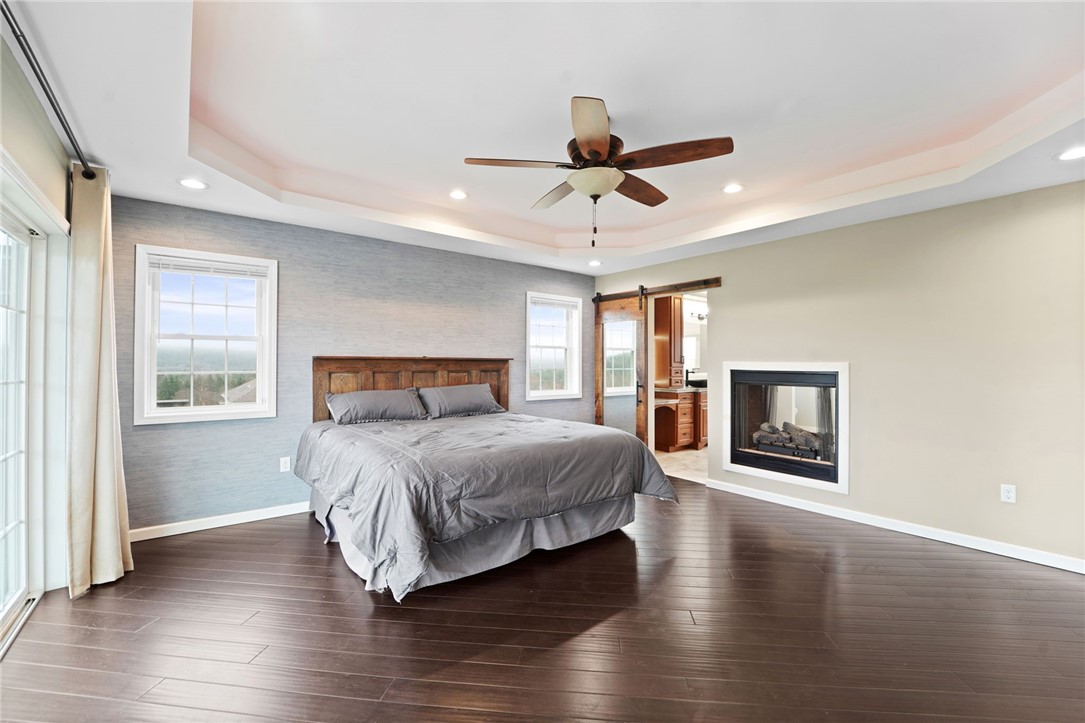 136 Vargo Road Horseheads, NY 14845 - Photo 23 of 38 Primary suite, see through fireplace into primary