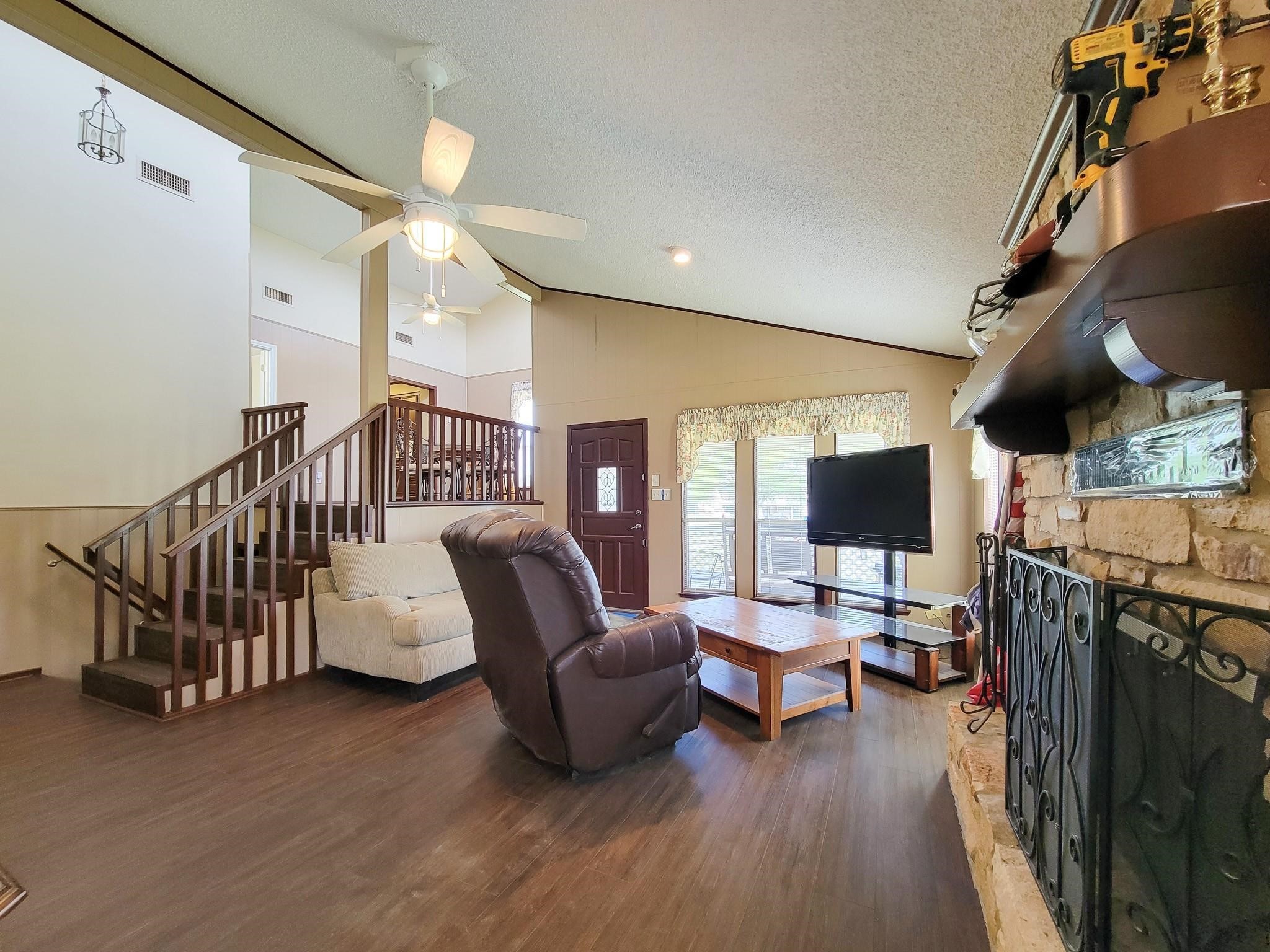 50 Sportsman Trail Coldspring, TX 77331 - Photo 14 of 42 a living room with furniture and a flat screen tv