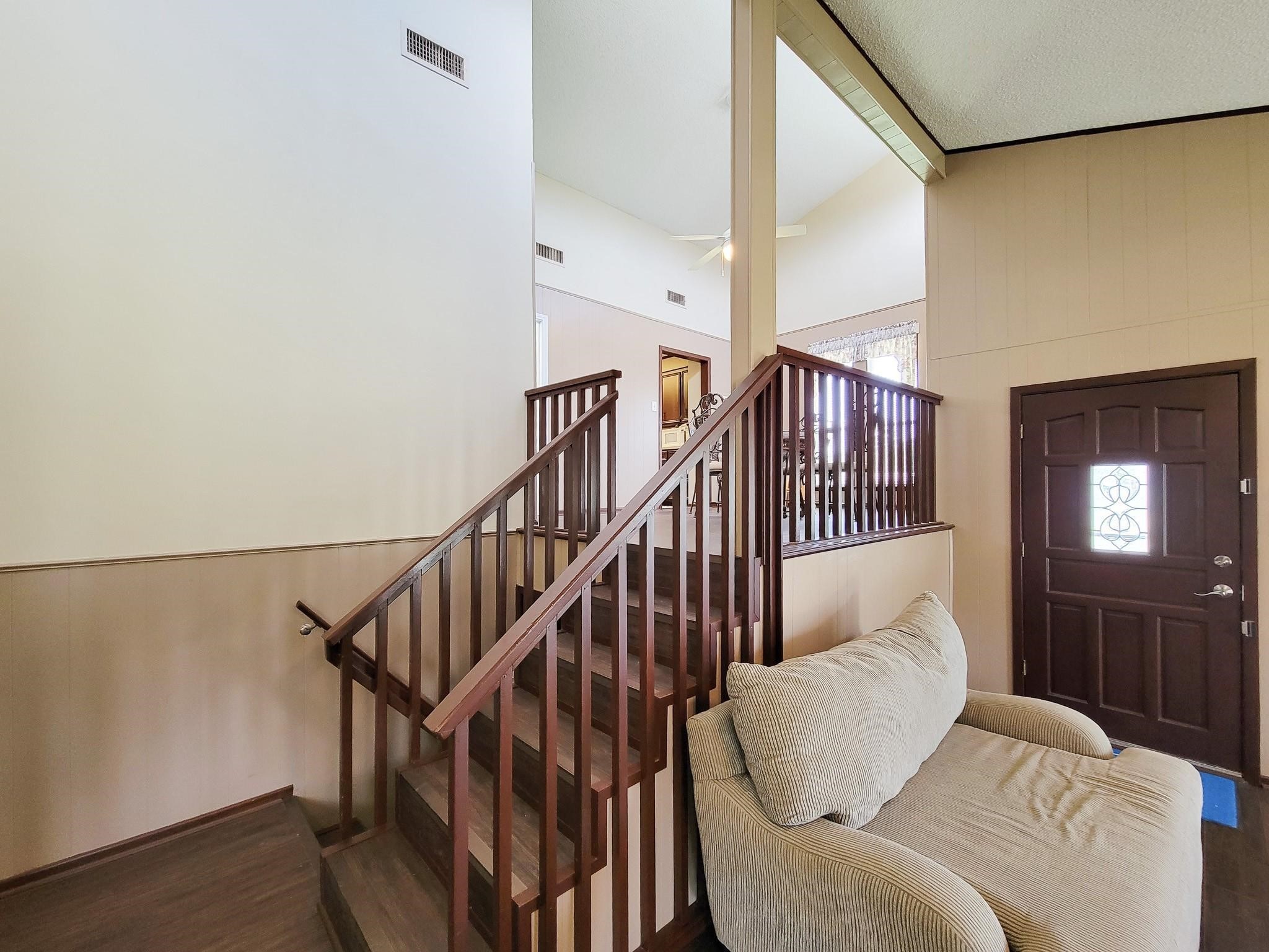 50 Sportsman Trail Coldspring, TX 77331 - Photo 15 of 42 a living room with furniture or stairs and a wooden floor