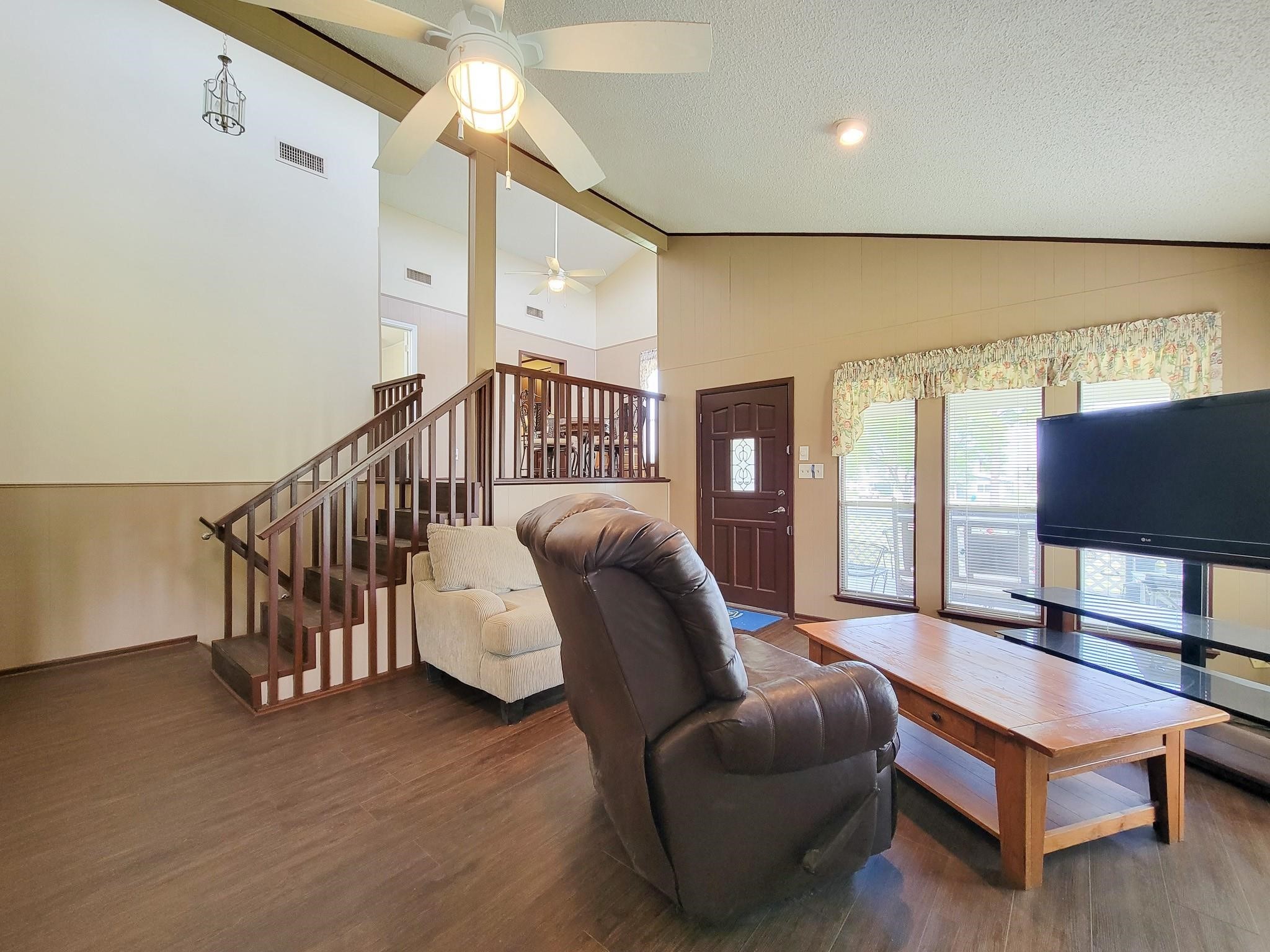 50 Sportsman Trail Coldspring, TX 77331 - Photo 16 of 42 a living room with furniture and a flat screen tv