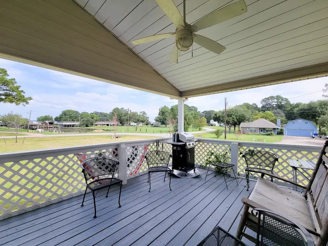 a view of a chairs and table on the terrace