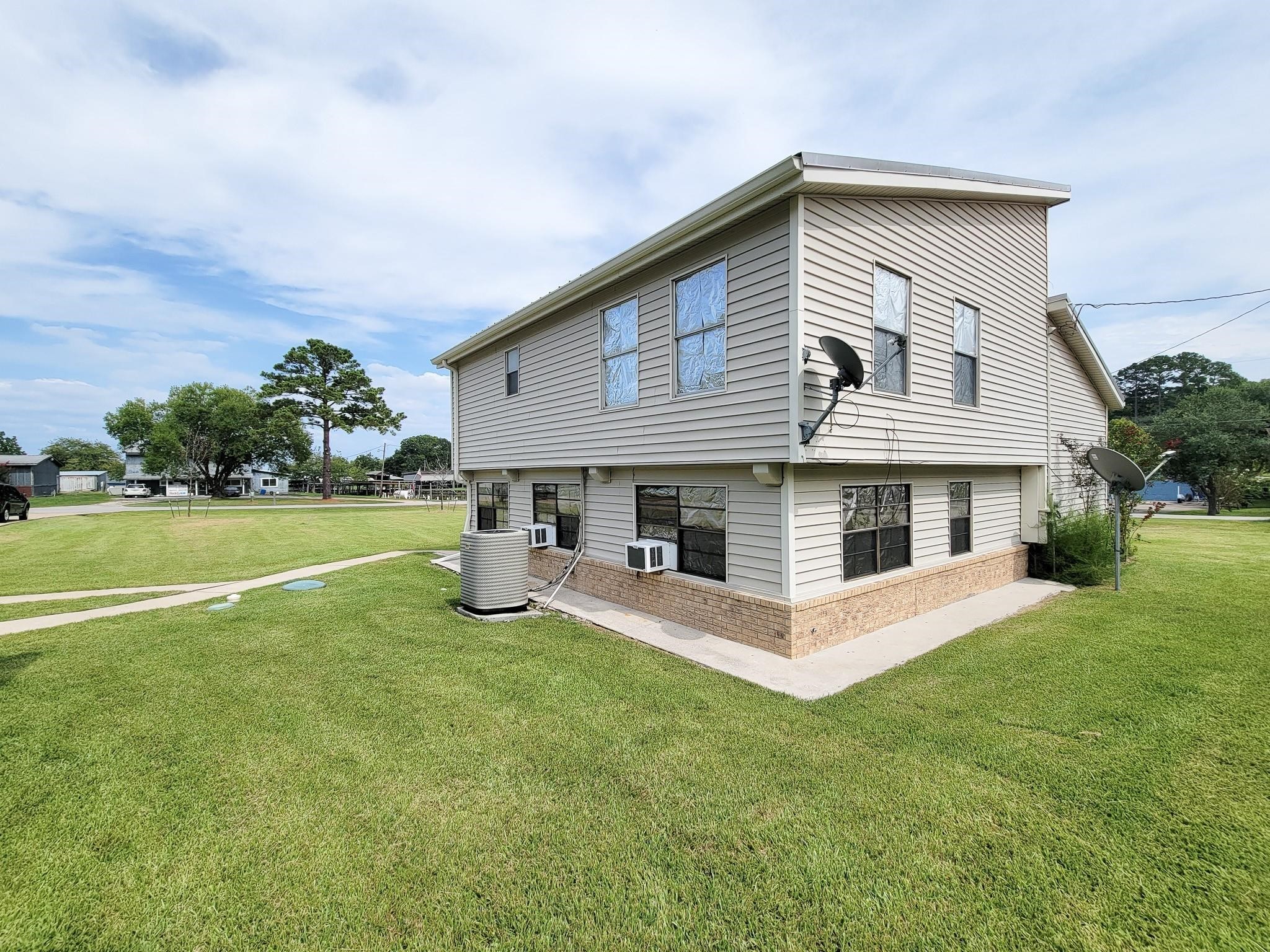 50 Sportsman Trail Coldspring, TX 77331 - Photo 41 of 42 a view of a house with backyard porch and sitting area